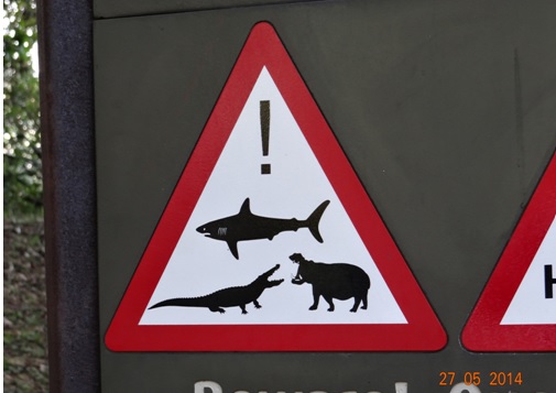 Warninng signs in St Lucia on our 5 Day Hluhluwe Umfolozi Big 5 Safari Tour including St Lucia and Durban