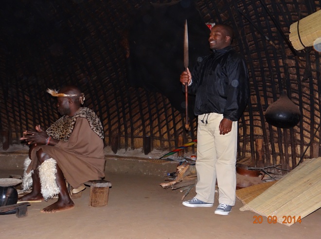 Demonstration of King Shakas Invention the Assagai on our Durban Safari near Durban to Tala game reserve, Valley of 1000 Hills and Zulu Cultural Village